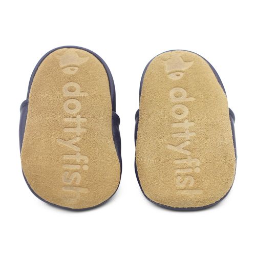 Non-slip soft suede soles of Dotty Fish pre-walker shoes imprinted with Dotty Fish name and logo.