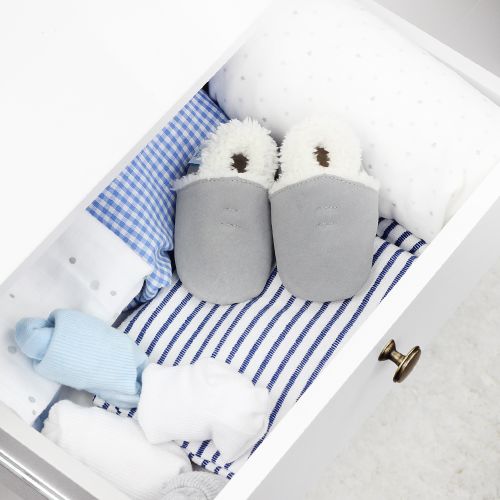 Dotty Fish pale grey slippers in drawer, with baby blankets.