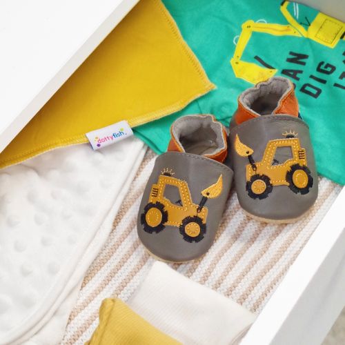 Leather digger shoes with baby blankets.