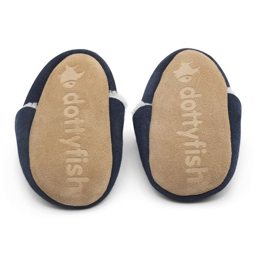 Non-slip soft suede soles of Dotty Fish pre-walker slippers imprinted with Dotty Fish name and logo.