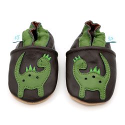 Brown leather Dotty Fish soft sole baby and toddler boy’s shoes with green ankle trim and dinosaur design.