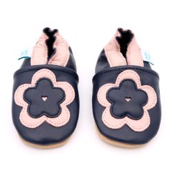 Navy leather Dotty Fish soft sole baby and toddler first walker shoes for girls with pink ankle trim and pink and navy flower.