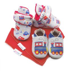 Dotty Fish baby gift set including cotton vehicle booties, leather train shoes and two red cotton bibs.