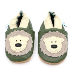 Green leather Dotty Fish soft sole baby and toddler boy’s shoes with cream ankle trim and cream bear design.
