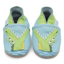 Light blue leather Dotty Fish soft sole baby and toddler boy’s shoes with green ankle trim and crocodile design.