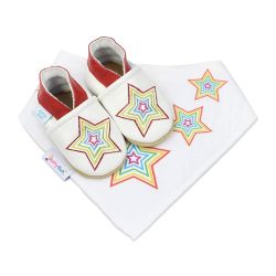White Dotty Fish soft sole shoes with red ankle trim and rainbow embroidered star design, with a matching white bib with rainbow star pattern.