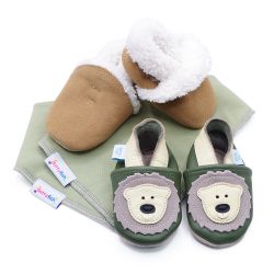 Dotty Fish baby gift set including tan suede slippers, leather bear shoes and two olive green cotton bibs.