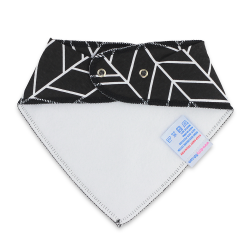 White fleece backing of black cotton Dotty Fish bandana bib with white geometric shapes, for infant girls and boys.