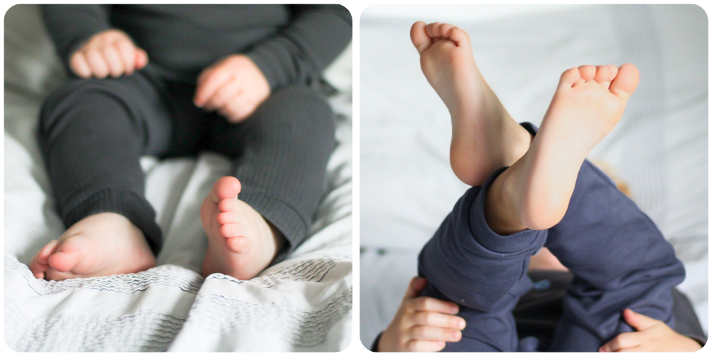 Baby and toddler with bare feet.